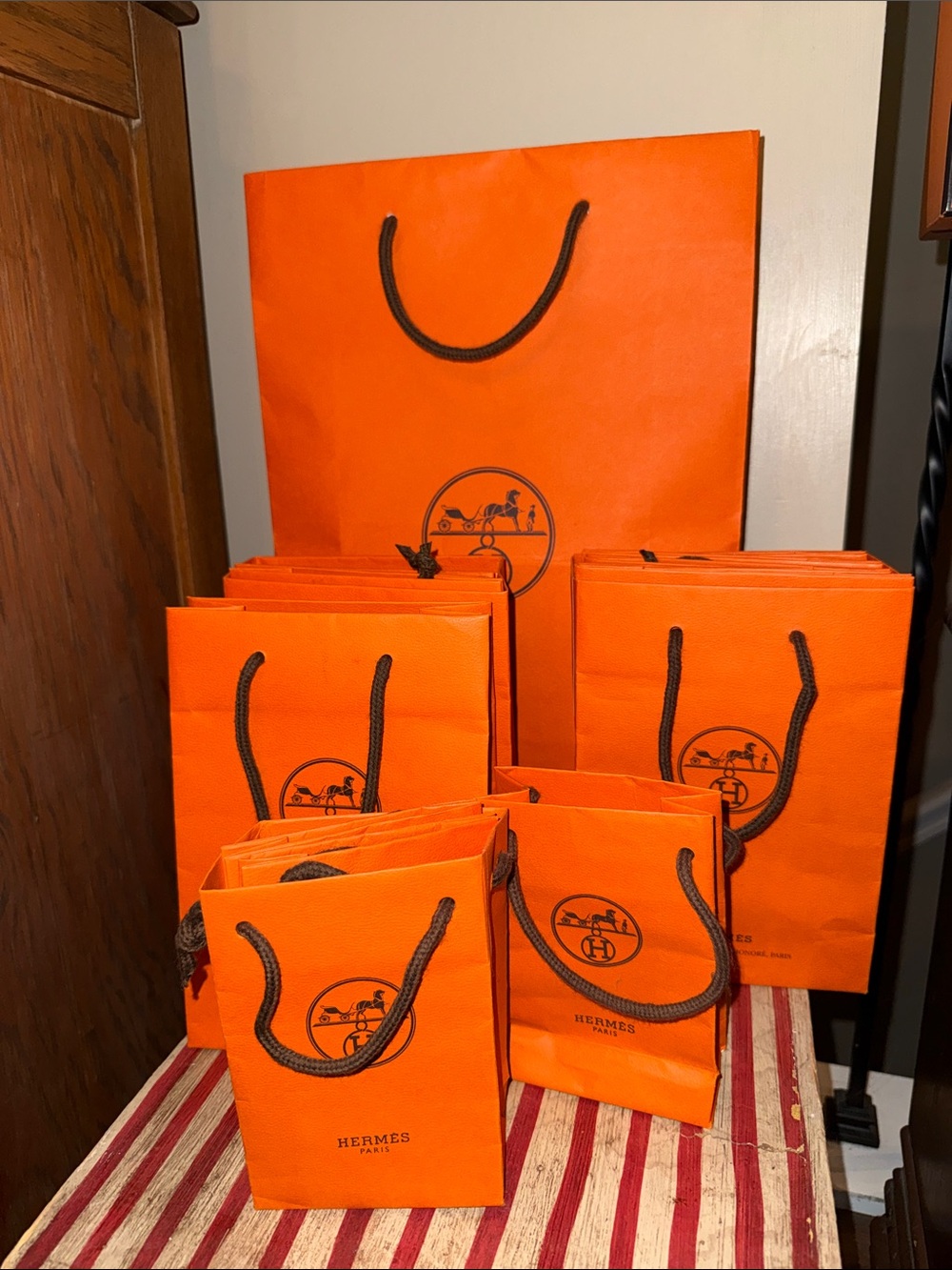 19 various sized Authentic Hermes bags